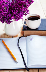 Beautiful lilac on office desk 