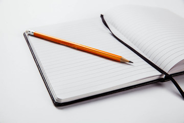 pencil on notebook