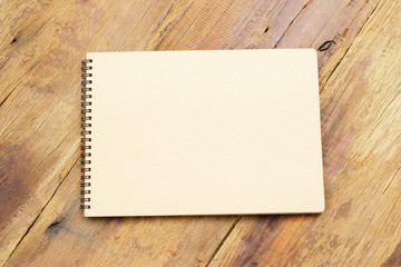 Notebook  on wooden table