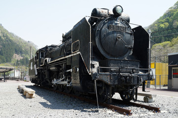 Fototapeta na wymiar Ancient steam locomotive and blue sky in Gumma Japan