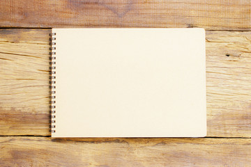 Notebook  on wooden table