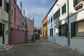 Colorful narrow street in Burano island, near Venice, Italy