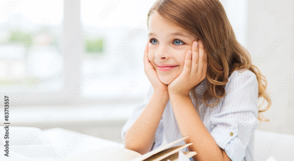 Wall mural student girl writing in notebook at school