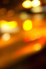Fototapeta premium golden bright lights on dark night background