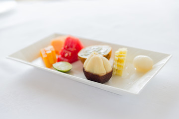 plate of fresh juicy fruit dessert at restaurant