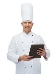 happy male chef cook holding tablet pc