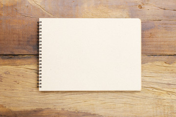 Notebook  on wooden table
