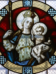 Virgin Mary with baby Jesus, stained glass window in Basilica Assumption of the Virgin Mary in...