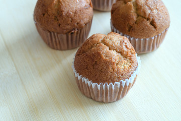 Banana cup cake on wooden background