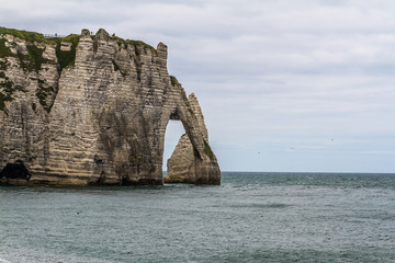 Famous natural cliffs in Etretat - French seaside resort.