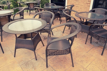 Sofa set made from wicker on the garden