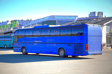 Royal Blue Coach Bus Waits for Passengers at Urban Bus Stop