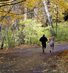 Fototapeta premium Man and woman running