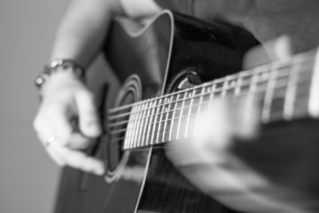 Fototapeta premium sliding hands on guitar