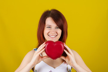 Love  concept with joyful young woman smiling 