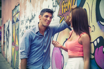 Young urban couple flirting