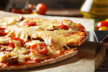 Fresh tasty pizza on cutting board