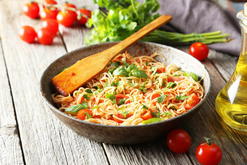 Spaghetti with tomatoes and basil