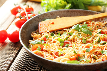 Spaghetti with tomatoes and basil