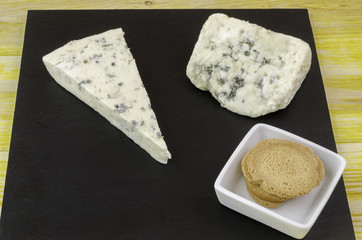 Roquefort and gornozola over slate plate.