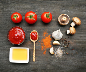 Ingredients for cooking pizza on wooden table, top view