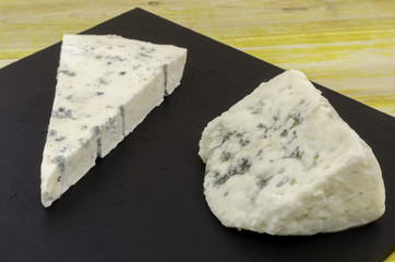 Roquefort and gornozola over slate plate.