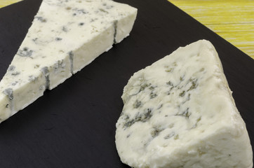 Roquefort and gornozola over slate plate.