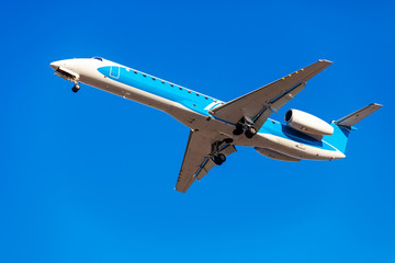 Airplane on blue sky