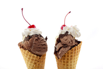 Summer concept chocolate and vanilla ice cream wafer cones.