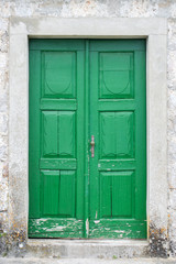Fototapeta na wymiar Old green front door