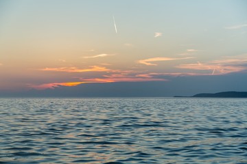 Coastline with horizon and sky