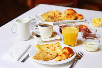 Delicious breakfast with pancakes