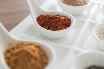 Wooden table of colorful spices