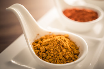 Wooden table of colorful spices