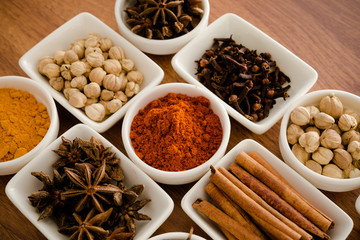 Wooden table of colorful spices