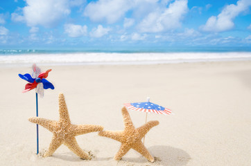 Fototapeta na wymiar Patriotic USA background with starfishes