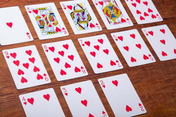 Playing cards on wooden background