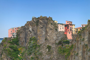 Fototapeta na wymiar Houses on the cliff.