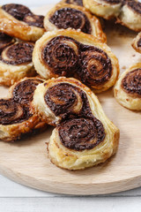 Palmier biscuits - french cookies made of puff pastry and chocol