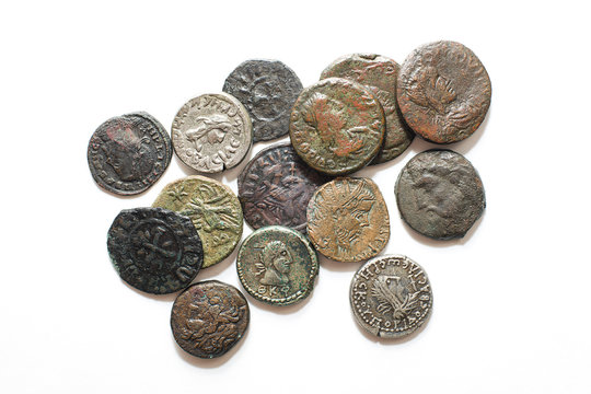 Vintage  coins with portraits on a white background