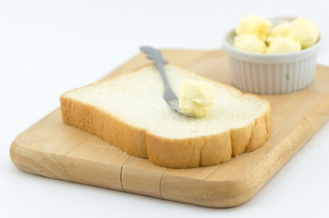 fresh butter on bread isolated