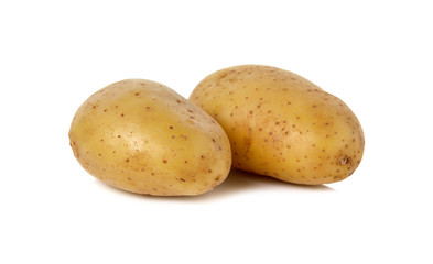 closeup unpeeled fresh potato on white background
