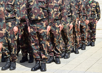 Soldiers in camouflage uniform