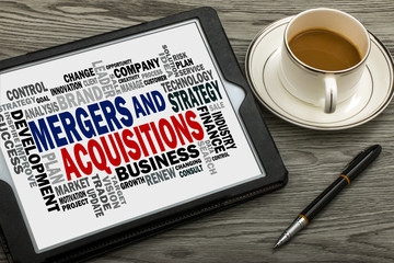 mergers and acquisitions with business word cloud handwritten on