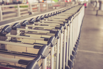 Trolleys luggage in a row in airport