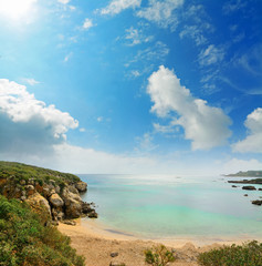 cloudy sky over Alghero shore