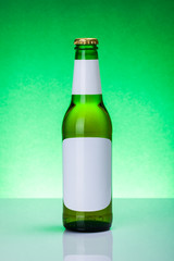 Green beer bottle with blank labels