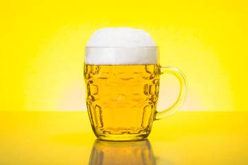 Mug with fresh, foamy beer