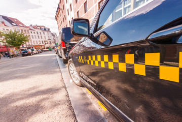BRUSSELS - MAY 1, 2015: City taxi awaits customers along the str