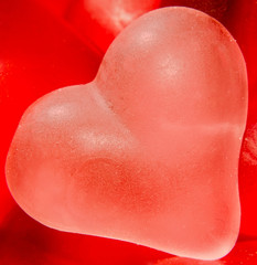 Colored heart shape jellies on a colored background